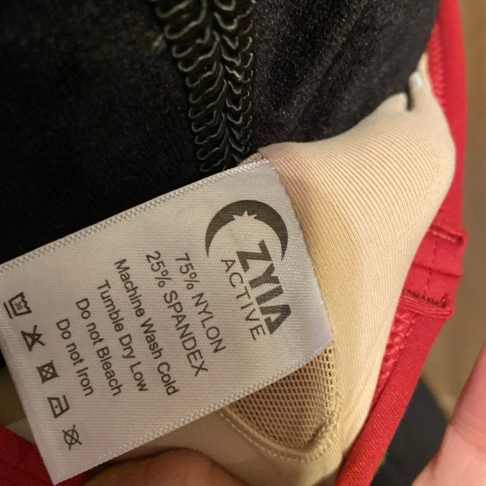 Game Day Light and Tight Sports Bra.Size Large, color is more burgundy than red. - Picture 4 of 5